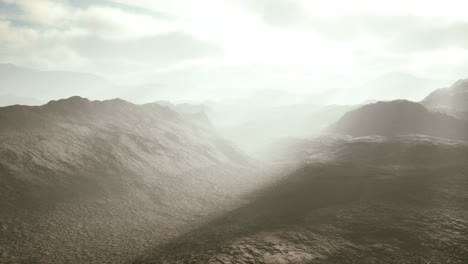 aerial-vulcanic-desert-landscape-with-rays-of-light